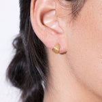 model wearing tilly earrings 18k