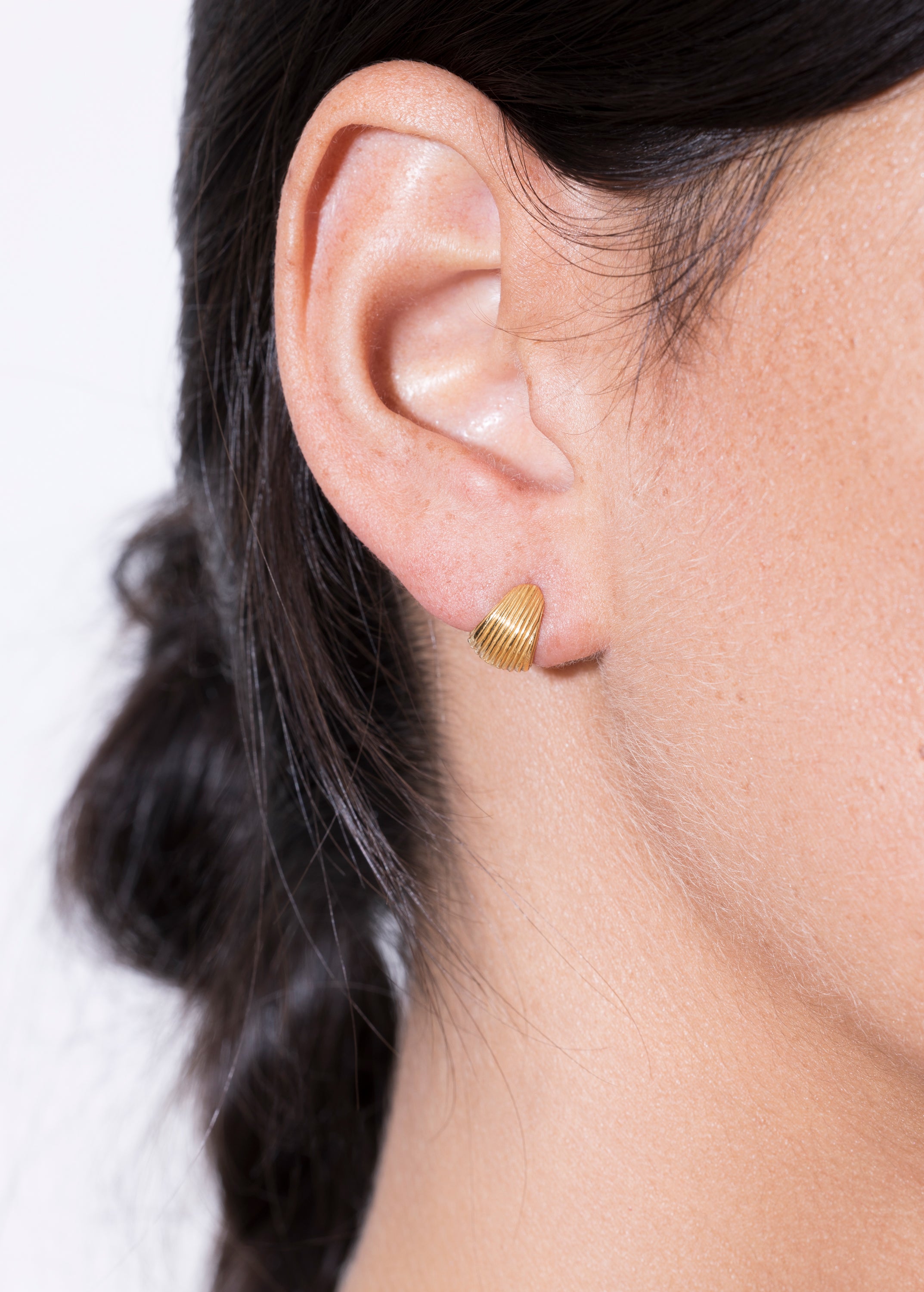model wearing tilly earrings 18k