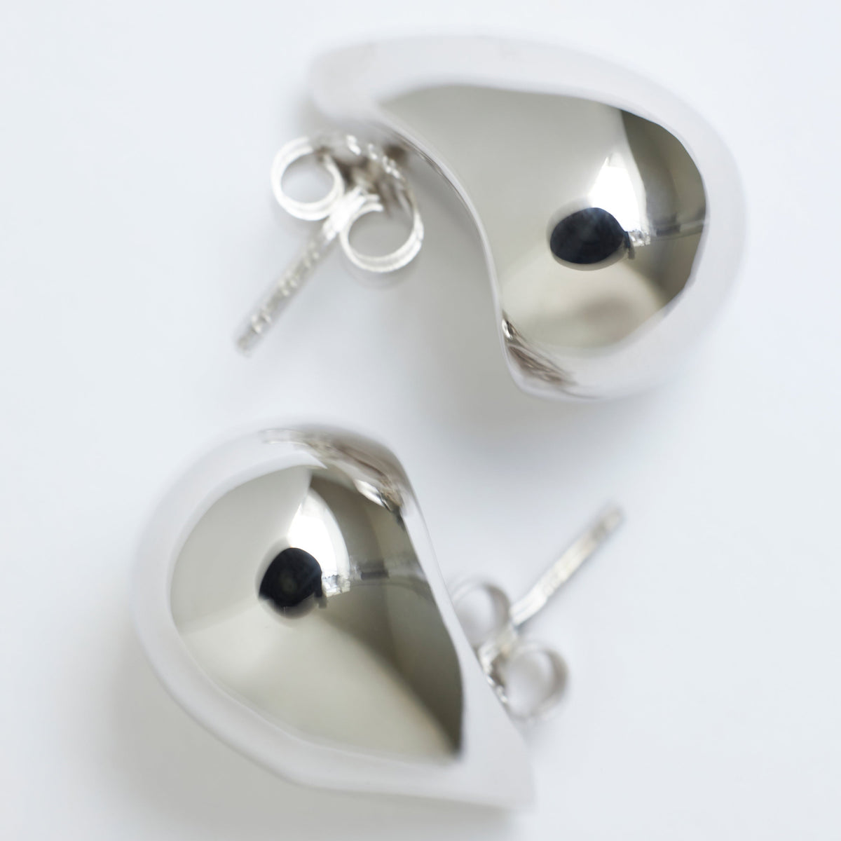 Stylish silver earrings from CINCO, part of affordable jewelry gifts under 75 euros.