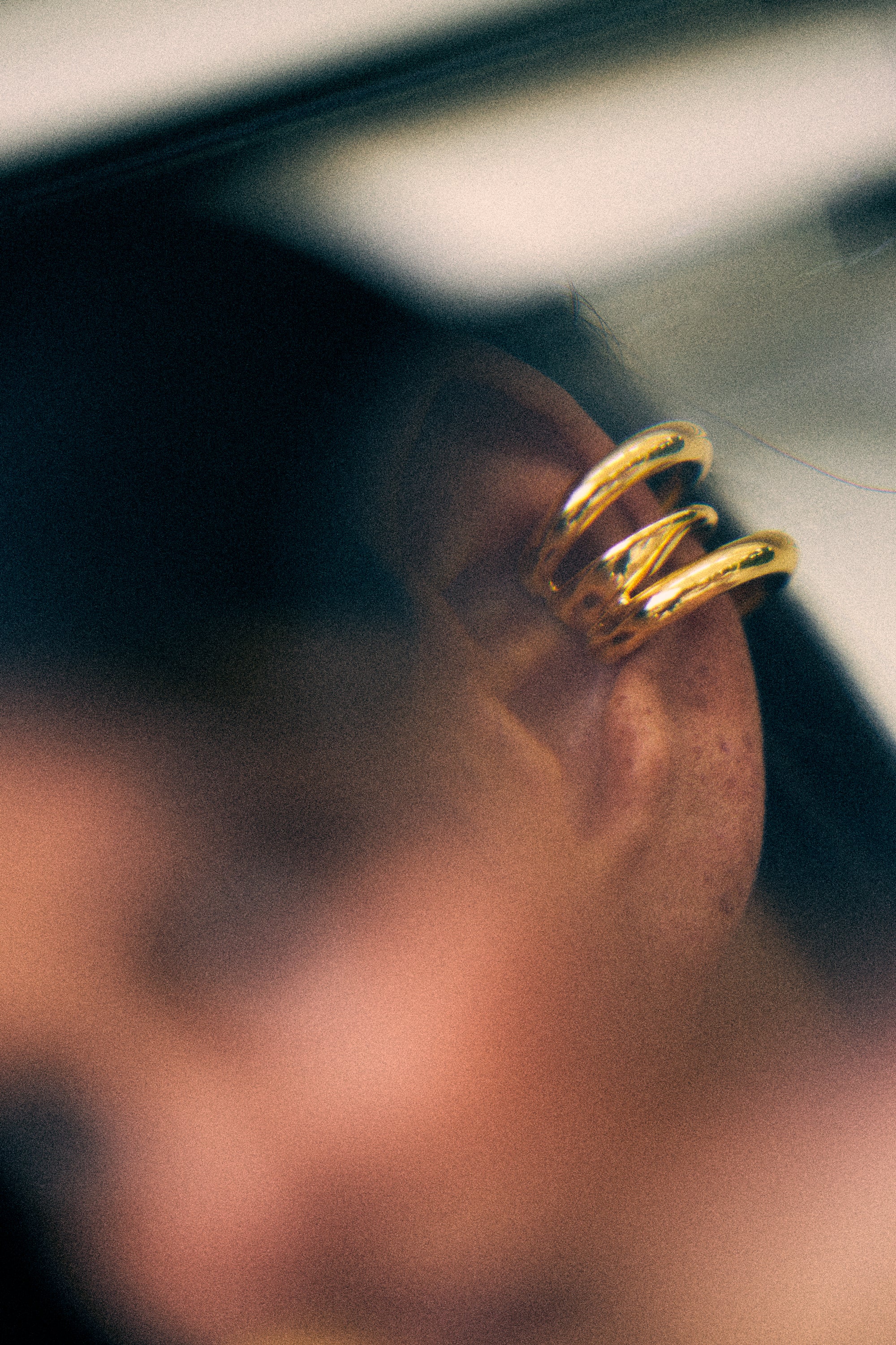 model wearing charli earcuff in gold