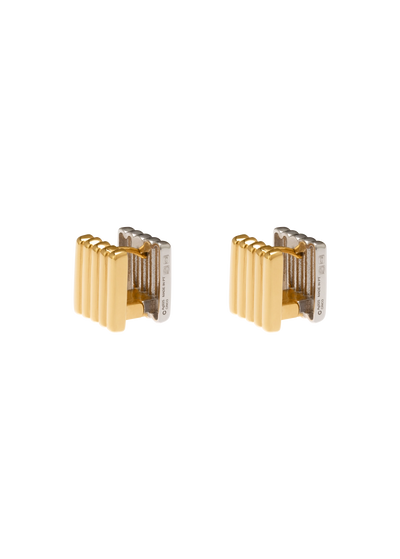A pair of gold and silver cufflinks with a ribbed rectangular design, shown on a plain white background.