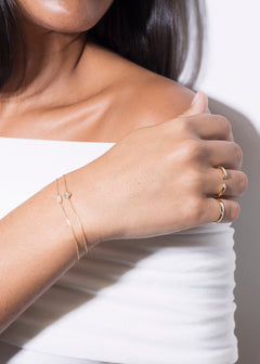 model wearing chris bracelet 18k diamond and hannah bracelet 18k diamond