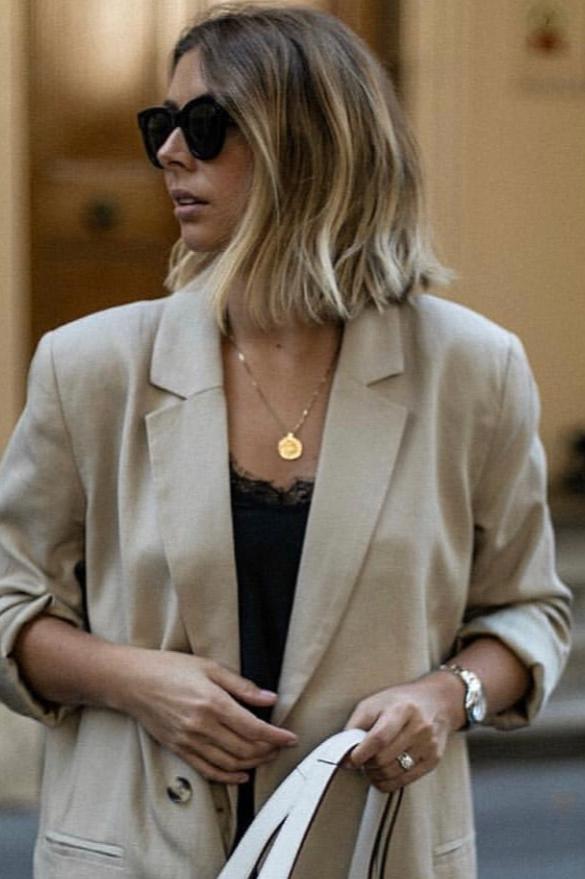 model wearing matilda necklace in gold