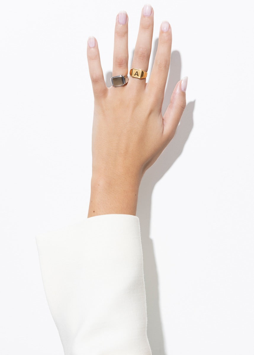 model wearing jose ring and giulia ring in gold