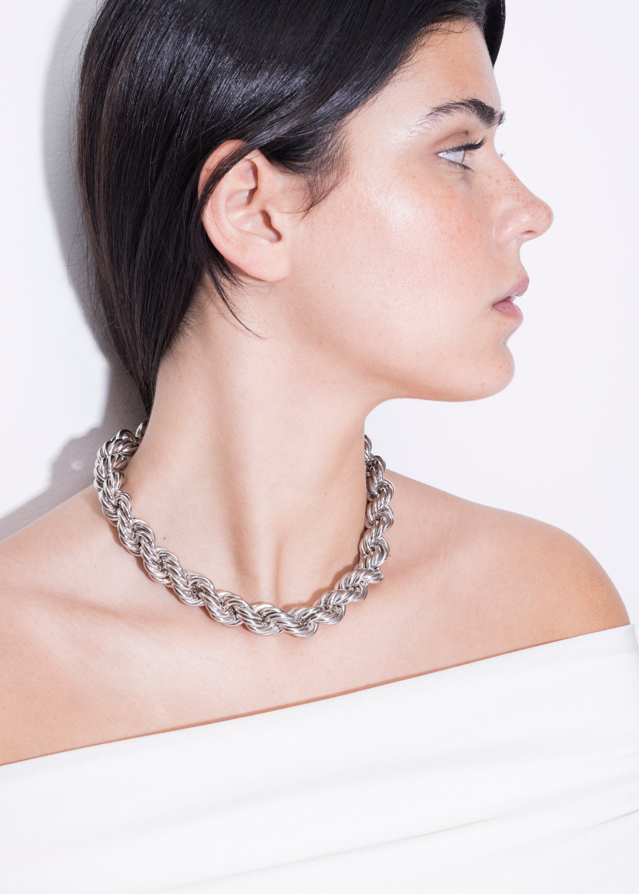 model wearing goliath bia necklace in silver